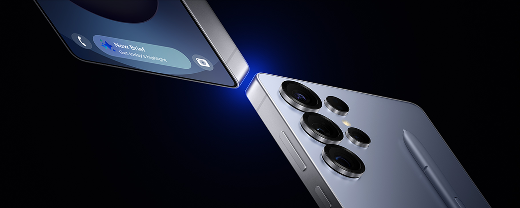 Smartphone charging on a wireless charging pad on a clean desk